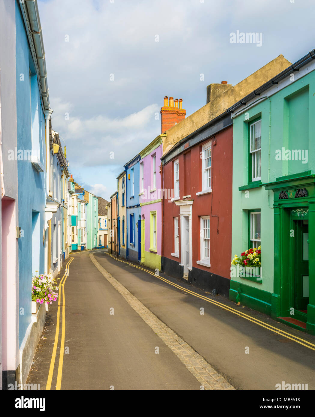 Colourful terraced houses on a narrow street in Appledore, Devon, England, UK Stock Photo
