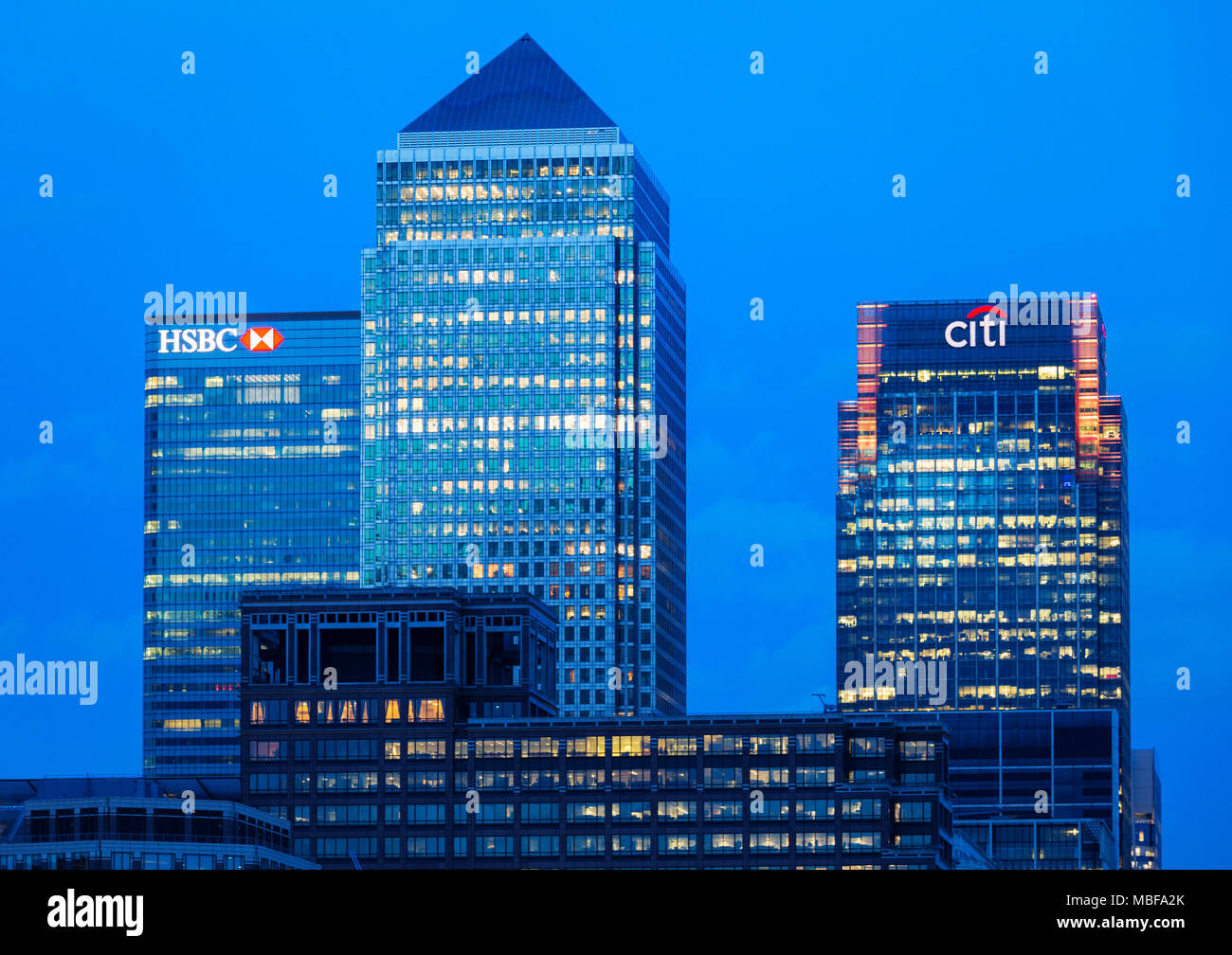 Canary Wharf skyline at night, Docklands, London, England UK Stock Photo