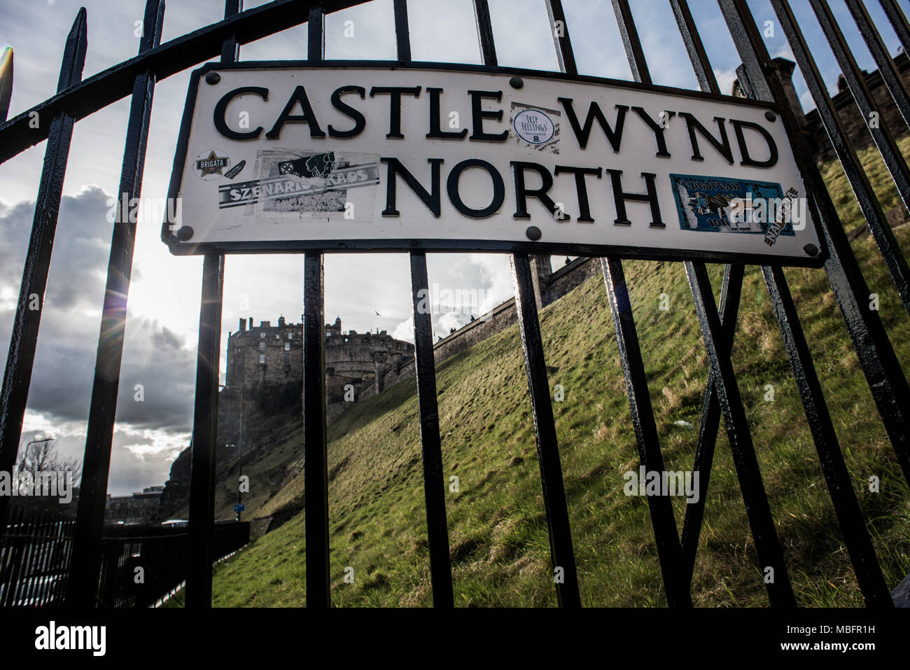 The banner of Castle Wynd Street with the Edinburgh Castle in background. Edinburgh is a city with a population of 500,000 in 2017, it the capital city of Scotland. Scotland has chosen to remain part of the United Kingdom at its referendum in 2014. Stock Photo