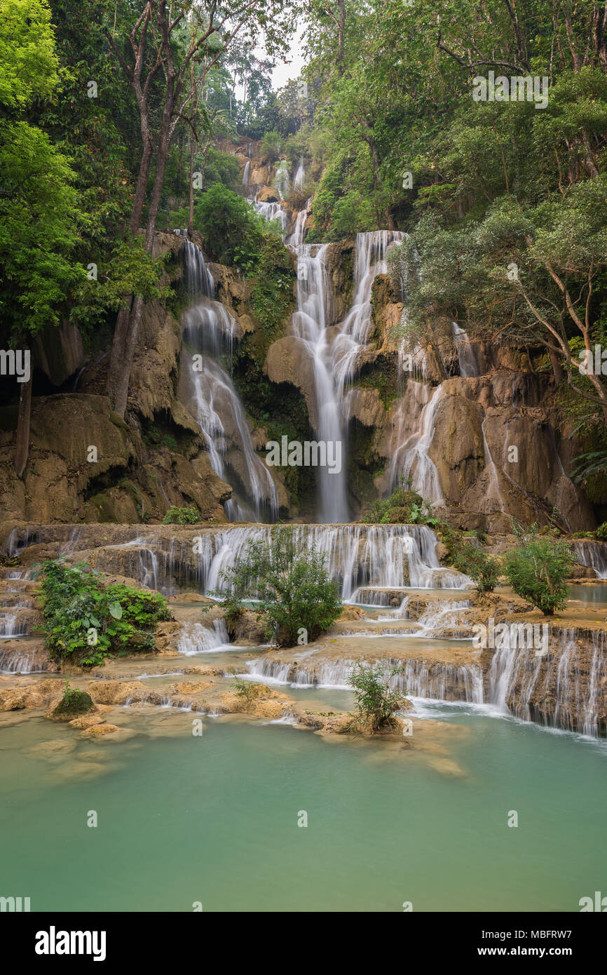 Beautiful view of the main fall at the Tat Kuang Si Waterfalls near Luang Prabang in Laos. Stock Photo