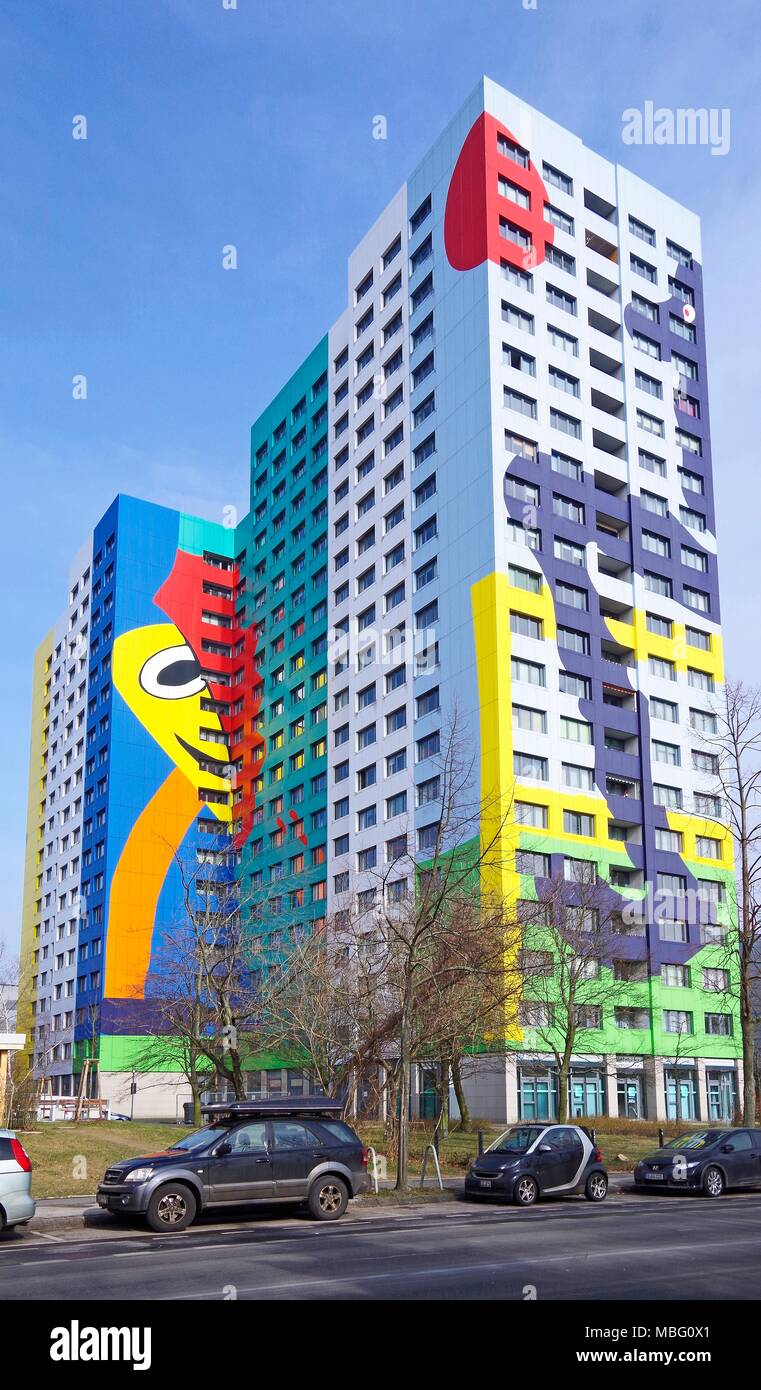 21 storey pre-fabricated concrete tower block built by GDR government, given new life by brightly-coloured abstract design by Gustavo Penalver Vico Stock Photo
