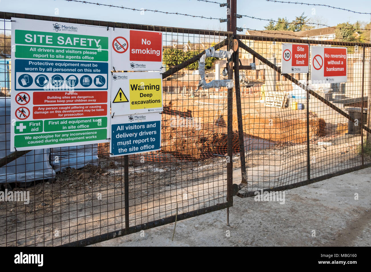 Site Safety Signs at construction building site in Henley on Thames, Oxfordshire, England, GB, UK Stock Photo