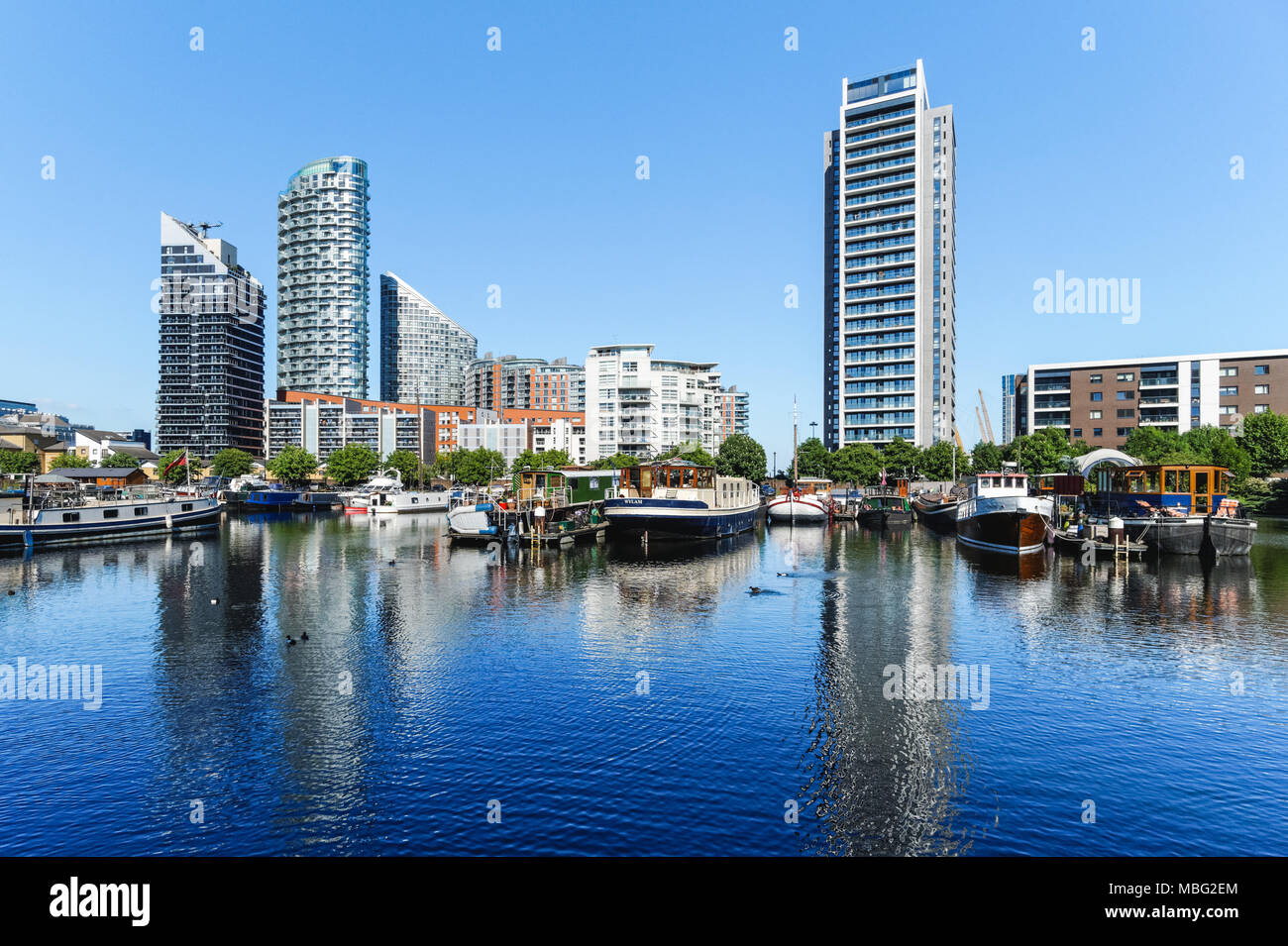 Poplar Dock Marina with modern luxury housing in London England United Kingdom UK Stock Photo