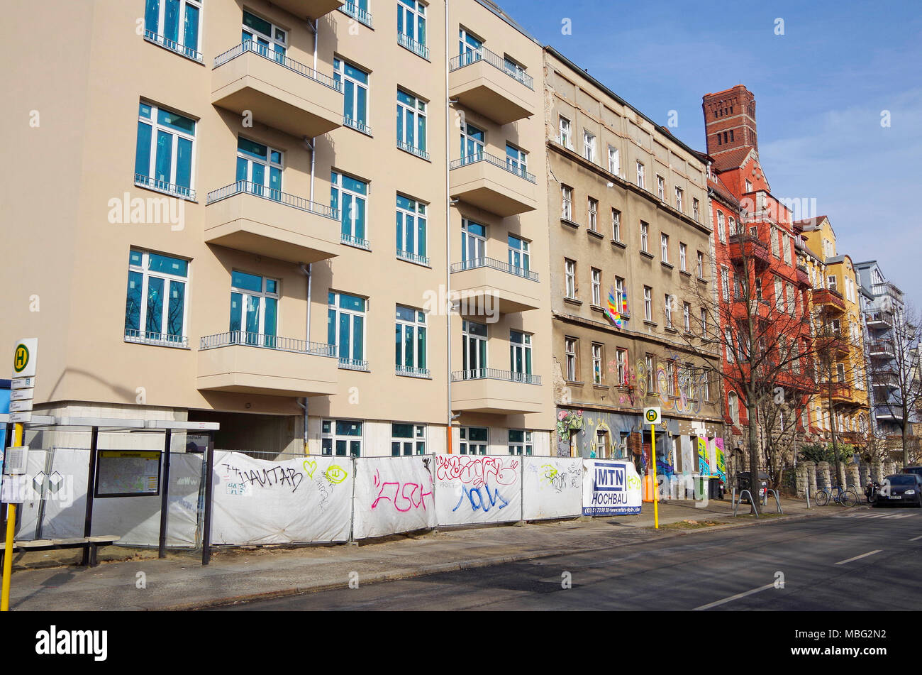 Contrasts, at left new-build or refurb, centre GDR post-war apartments at rightn two late 19th century apartment buildings & shot-tower of 1908 Stock Photo