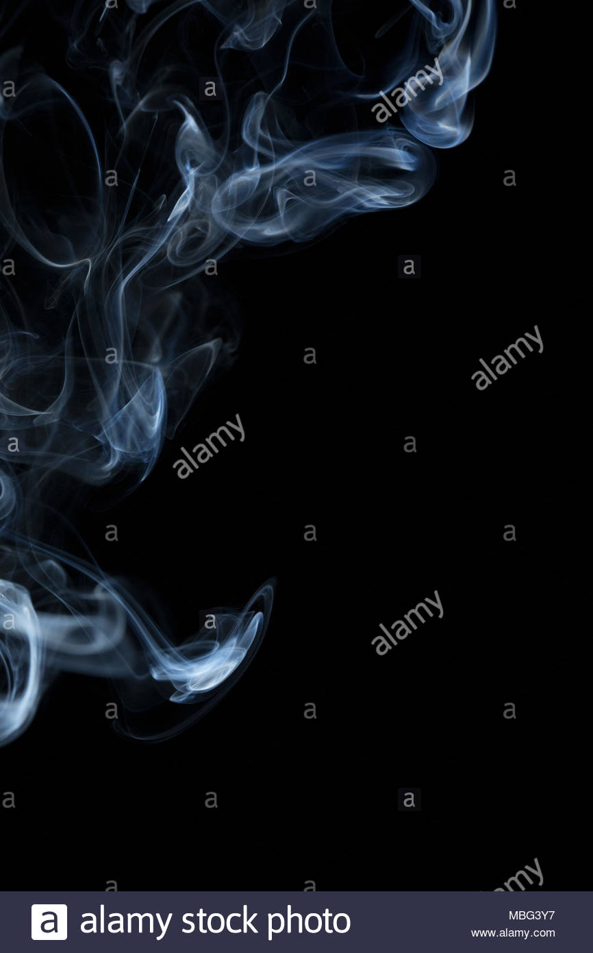 Blue smoke on black background Stock Photo