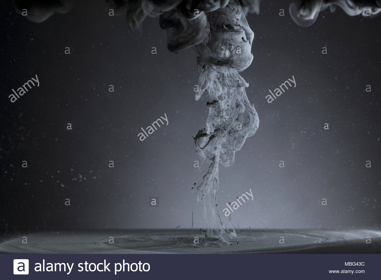 Mysterious, creative black liquid smoke rising Stock Photo Alamy