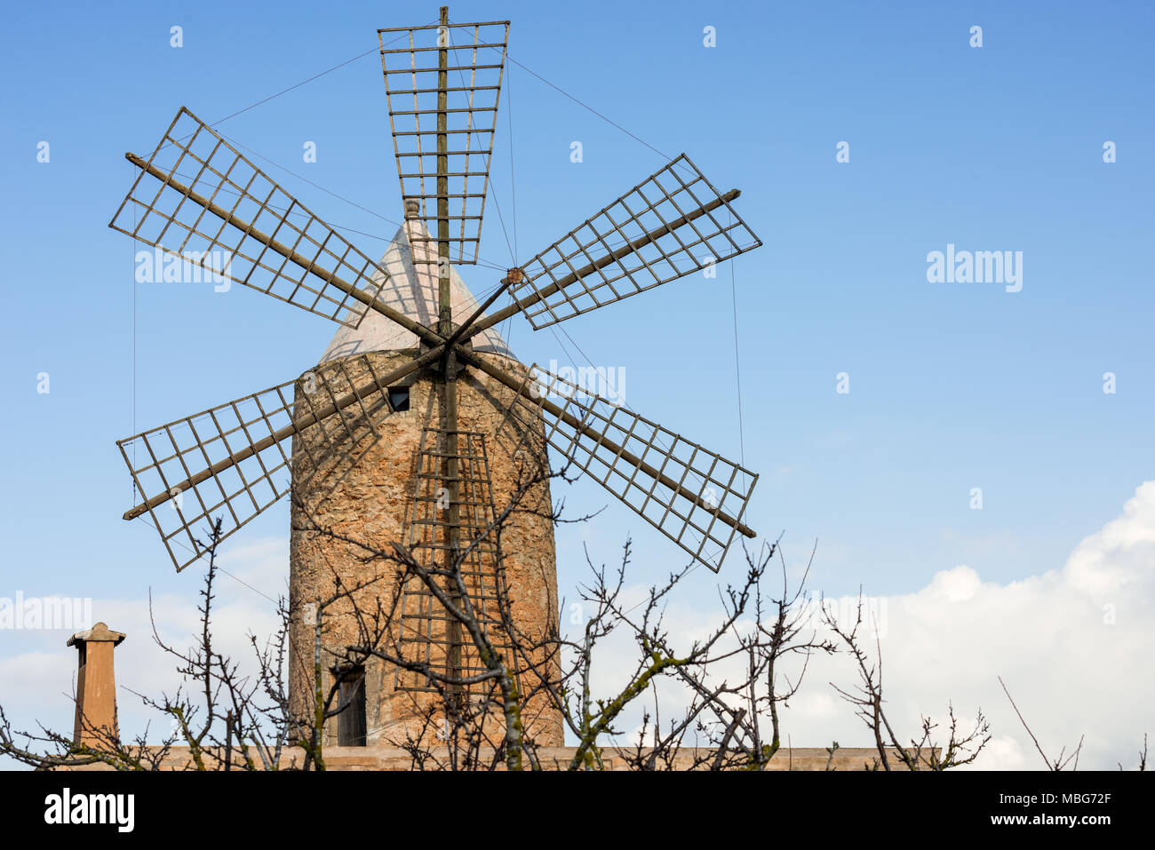 Windmill on a farm in Algaida on the island of Mallorca, Spain. Stock Photo