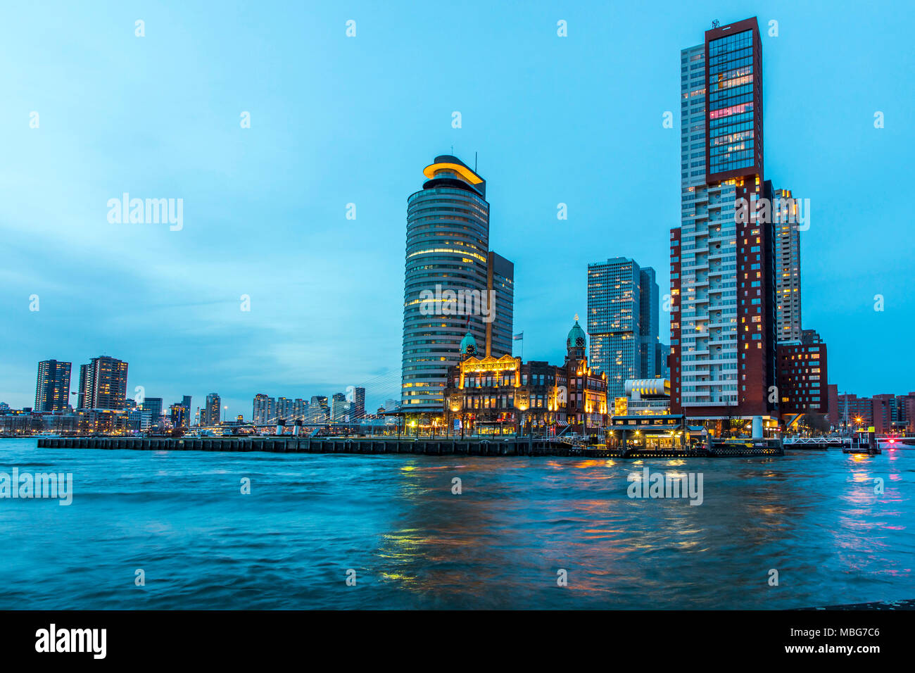 The skyline of Rotterdam, at the Nieuwe Maas, river, skyscrapers at the 'Kop van Zuid' district, Netherlands, Stock Photo