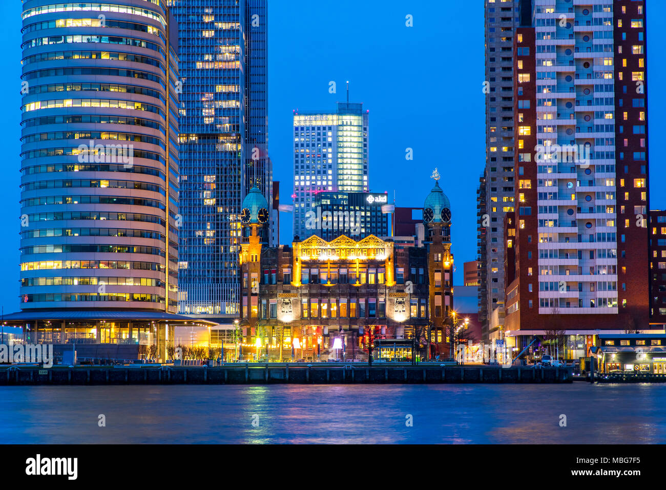 The skyline of Rotterdam, at the Nieuwe Maas, river, skyscrapers at the 'Kop van Zuid' district, Netherlands, Hotel New York, Stock Photo