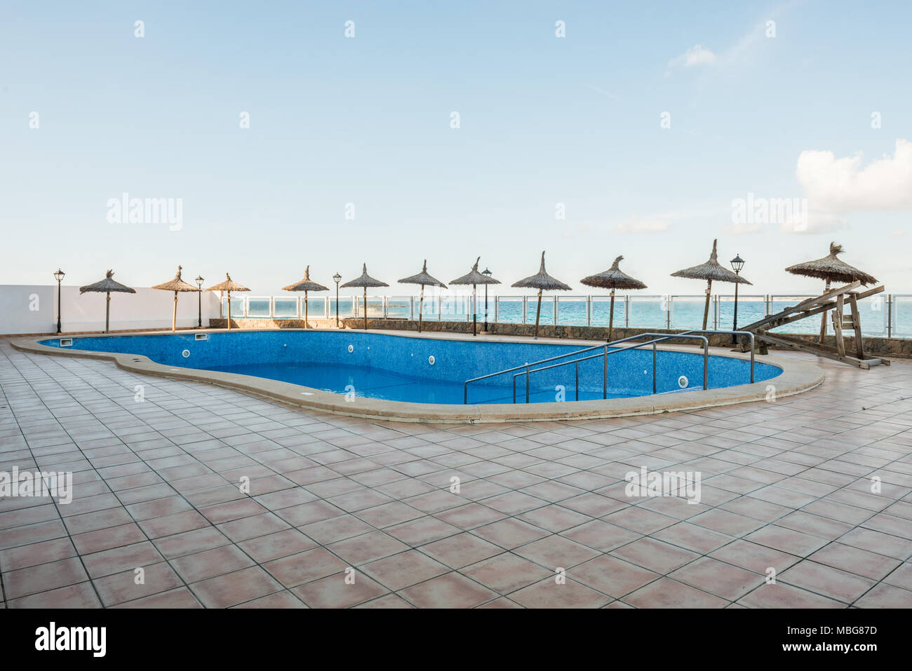 Ramp down to an empty hotel pool near Colonia de Sant Jordi, Mallorca Stock Photo