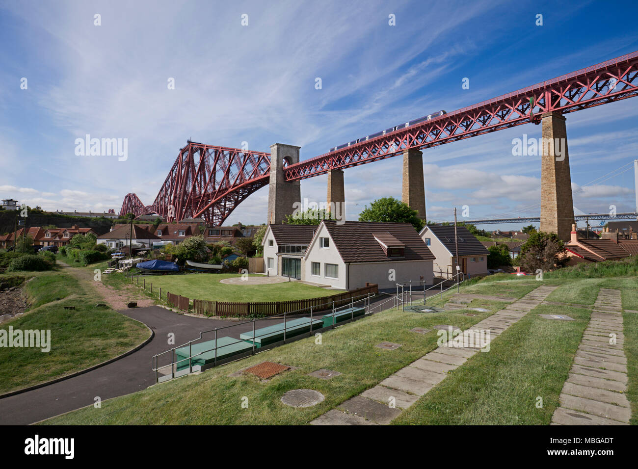 North Queensferry, The Forth railway Bridge (Fife) A Scotrail class 170 train passing Stock Photo