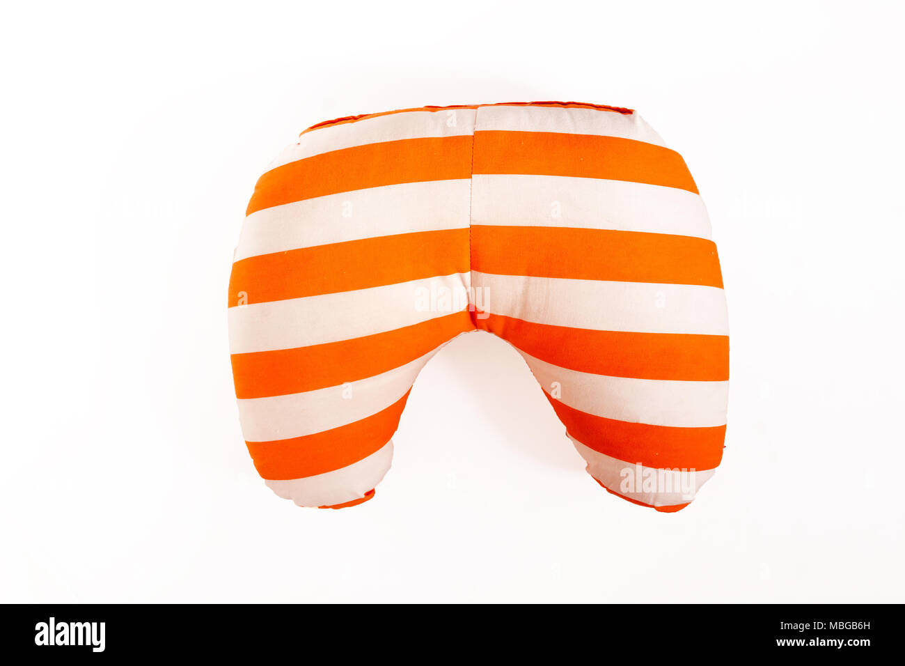 colored striped road travel pillow isolated on white background. Stock Photo