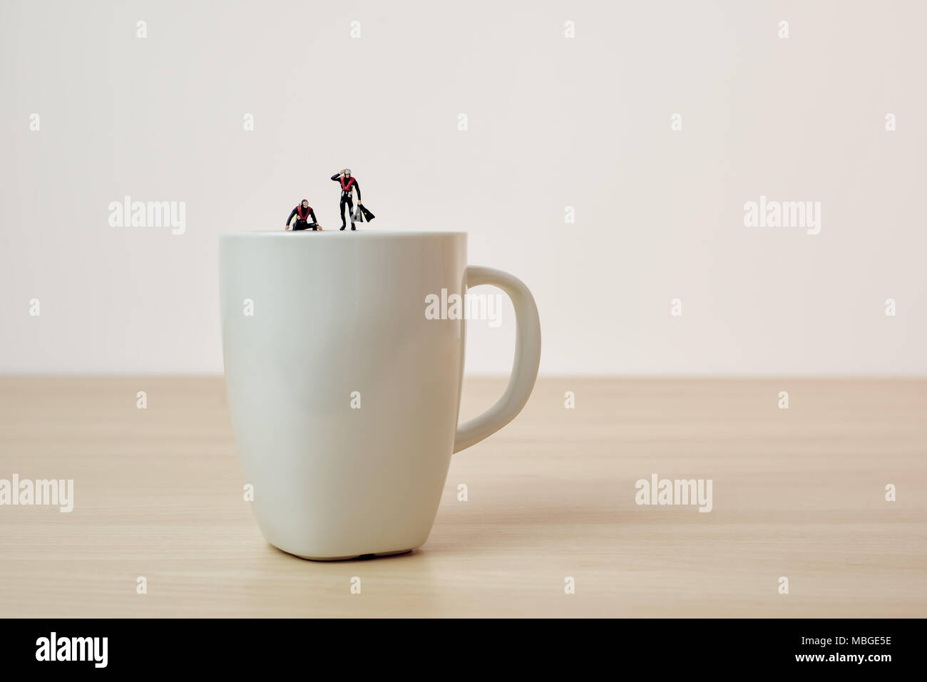 Coffee divers. Conceptual macro photo. Stock Photo
