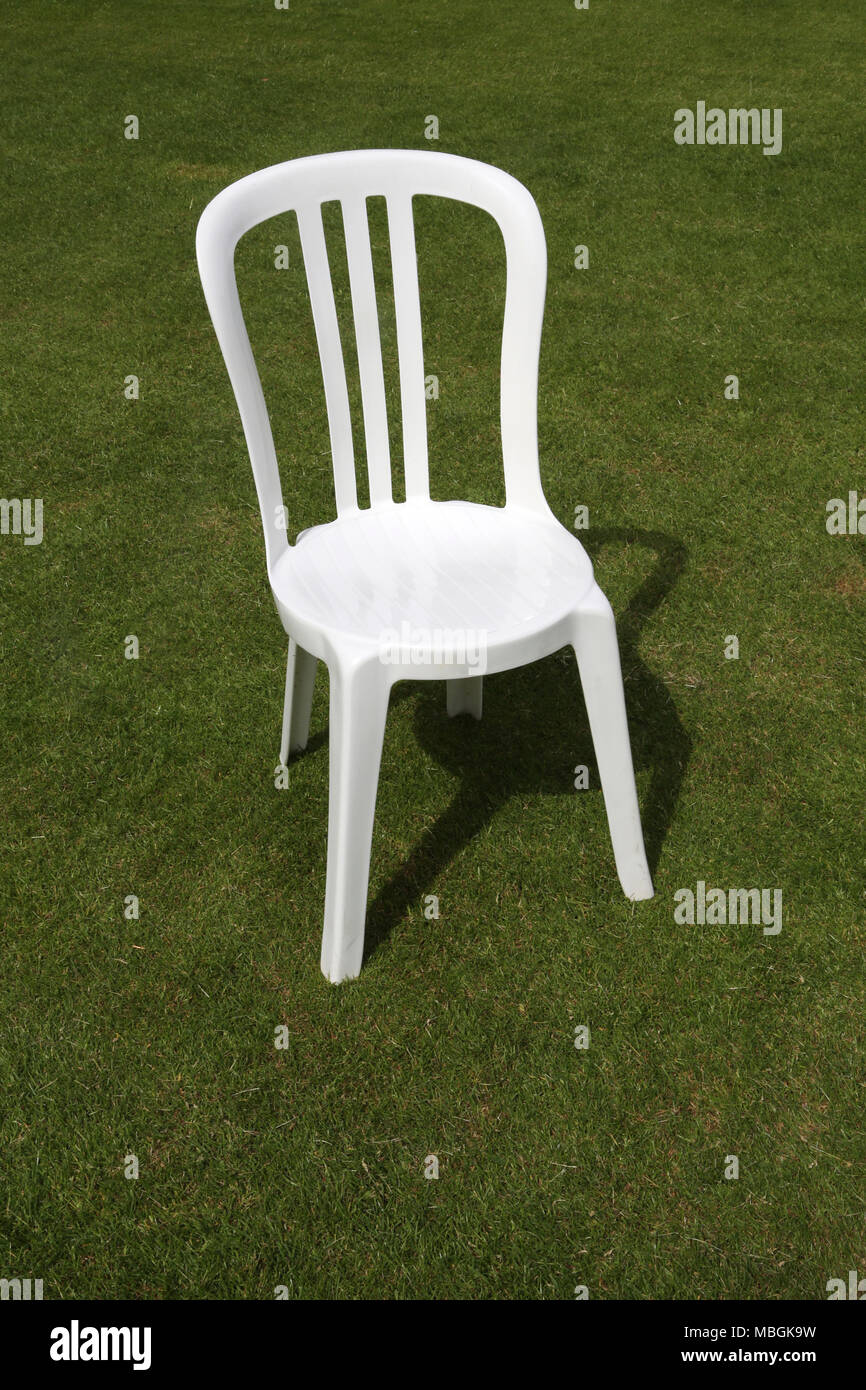White Plastic Garden Chair Stock Photo Alamy