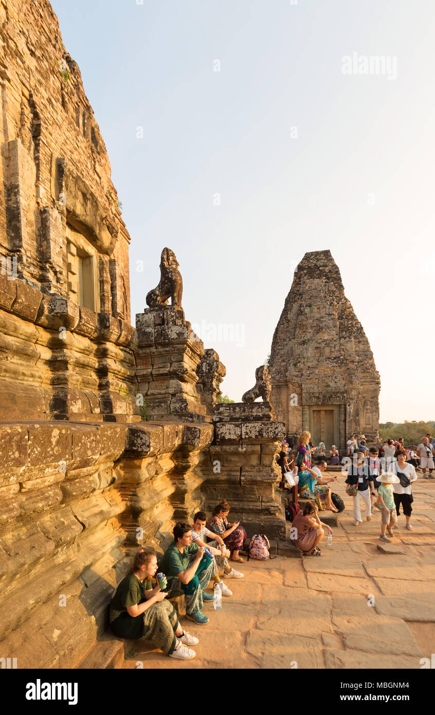 Angkor tourists - people watching sunset from Pre Rup temple, Angkor, Cambodia Asia Stock Photo