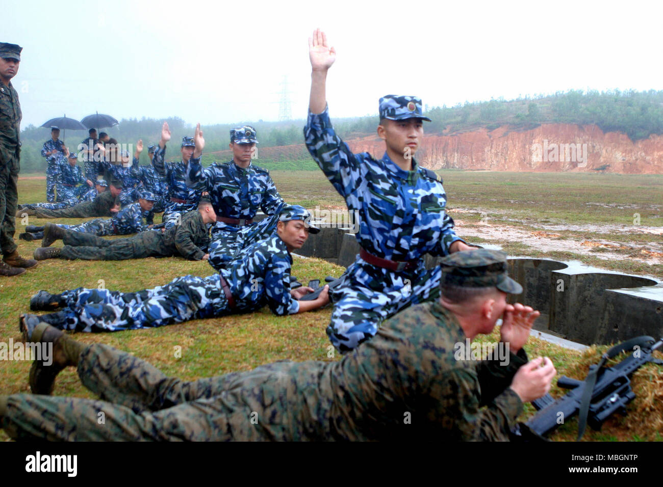 US & Chinese Marine at the Firing Range in China Stock Photo