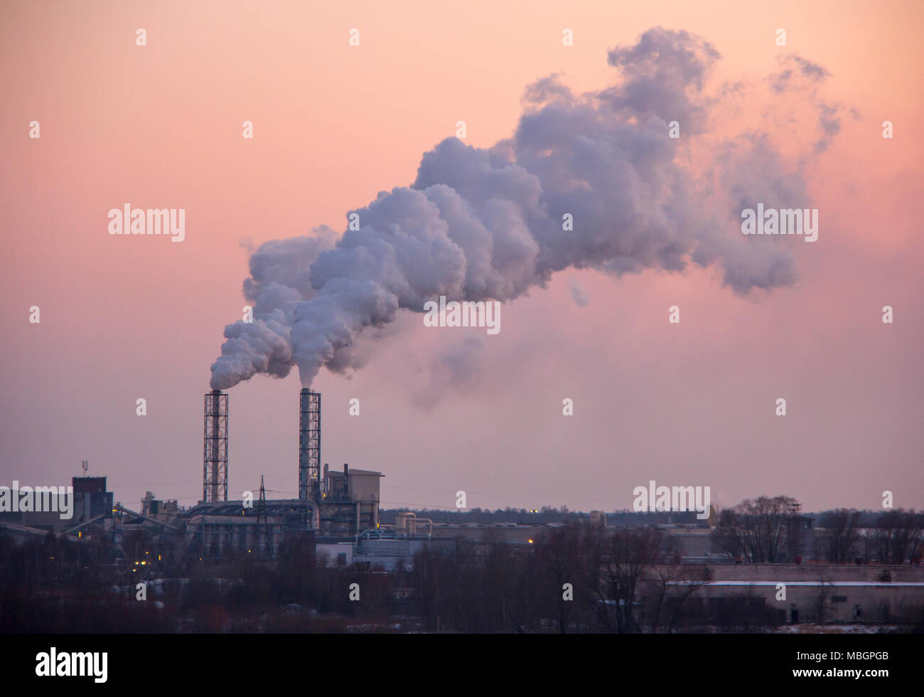 Chimney smoking stack. Air pollution and climate change theme. Poor