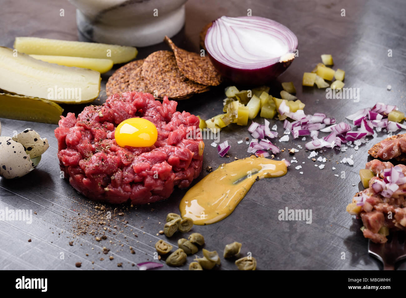 Steak tartare, gourmet delicacy raw meat starter. Minced beef dish with