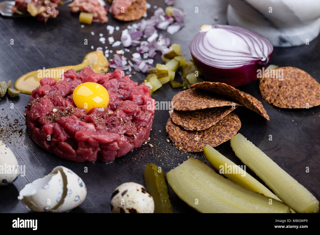 Steak tartare, gourmet delicacy raw meat starter. Minced beef dish with