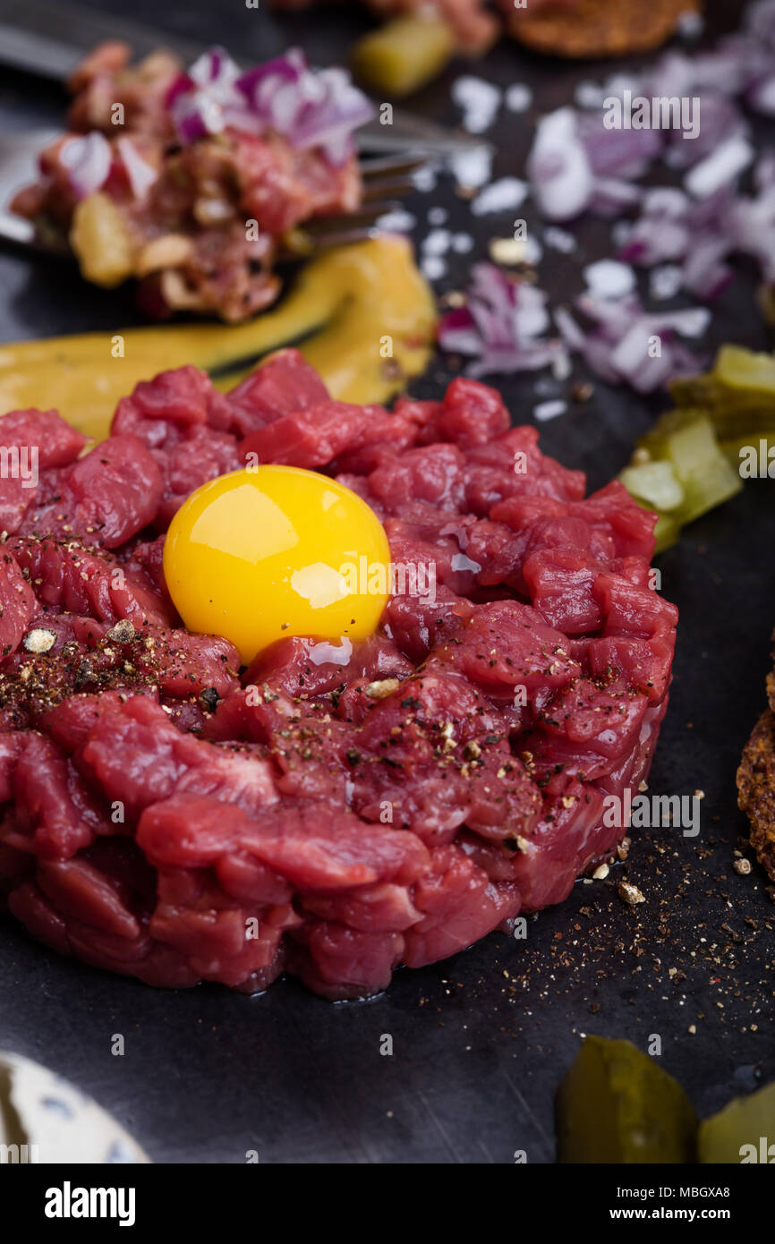 Steak tartare, gourmet delicacy raw meat starter. Minced beef dish ...