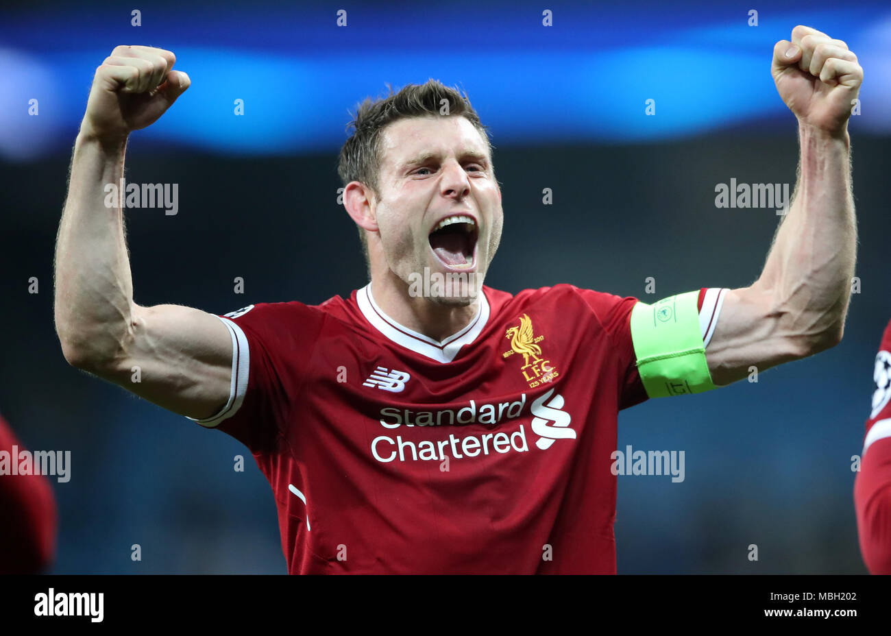 Liverpools james milner celebrates victory hi-res stock photography and ...