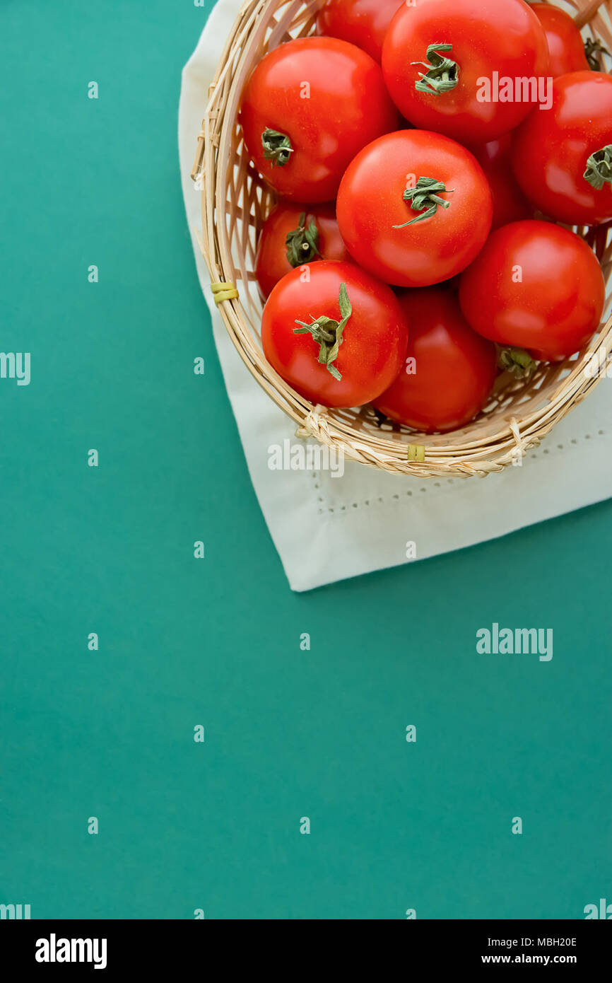 Fresh Ripe Organic Red Tomatoes in Wicker Basket on White Napkin Green ...