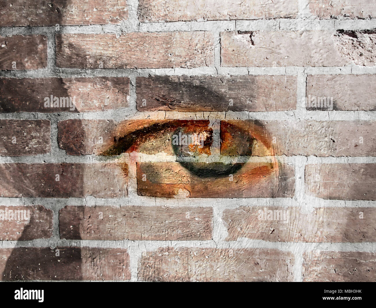 Textured and Painted Eye on Wall Stock Photo