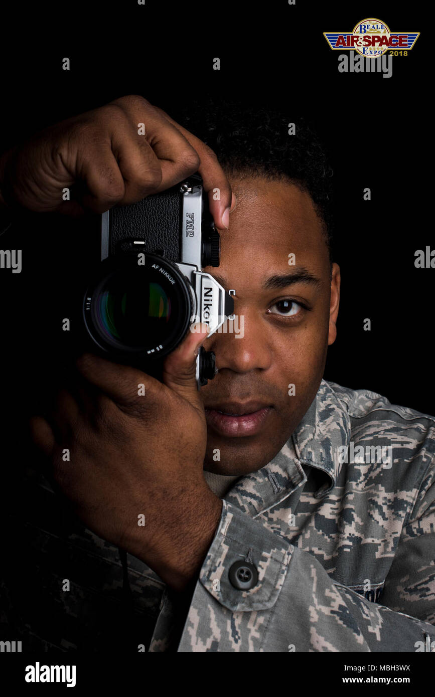Senior Airman Colville McFee, 9th Reconnaissance Wing Public Affairs photojournalist, poses for a photo at Beale Air Force Base, California Feb. 3, 2018. This is one photo in a series that highlights Airmen from different career fields at Beale. Stock Photo