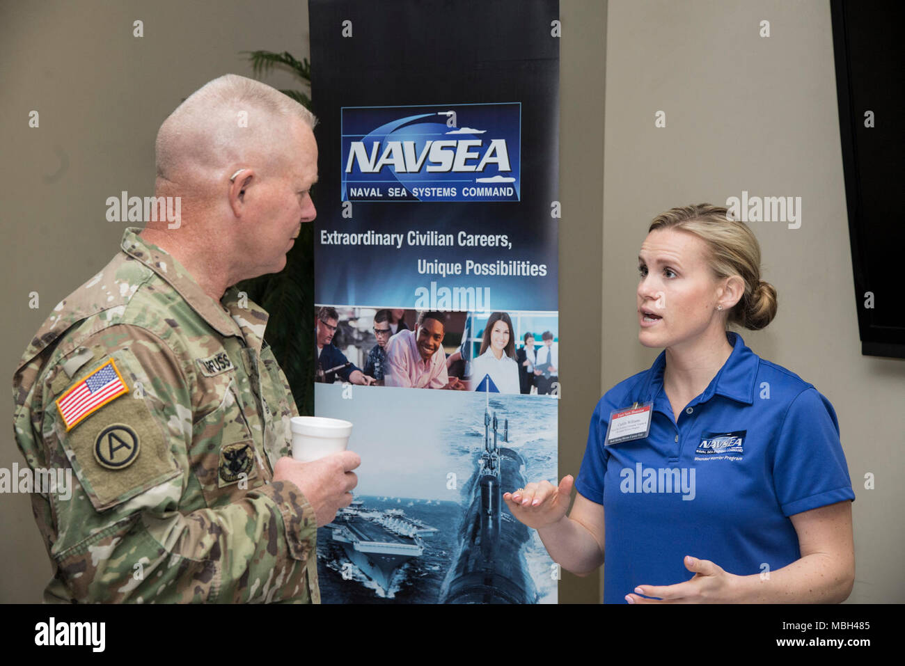 NAVSEA representative speaks with a transitioning Soldier about