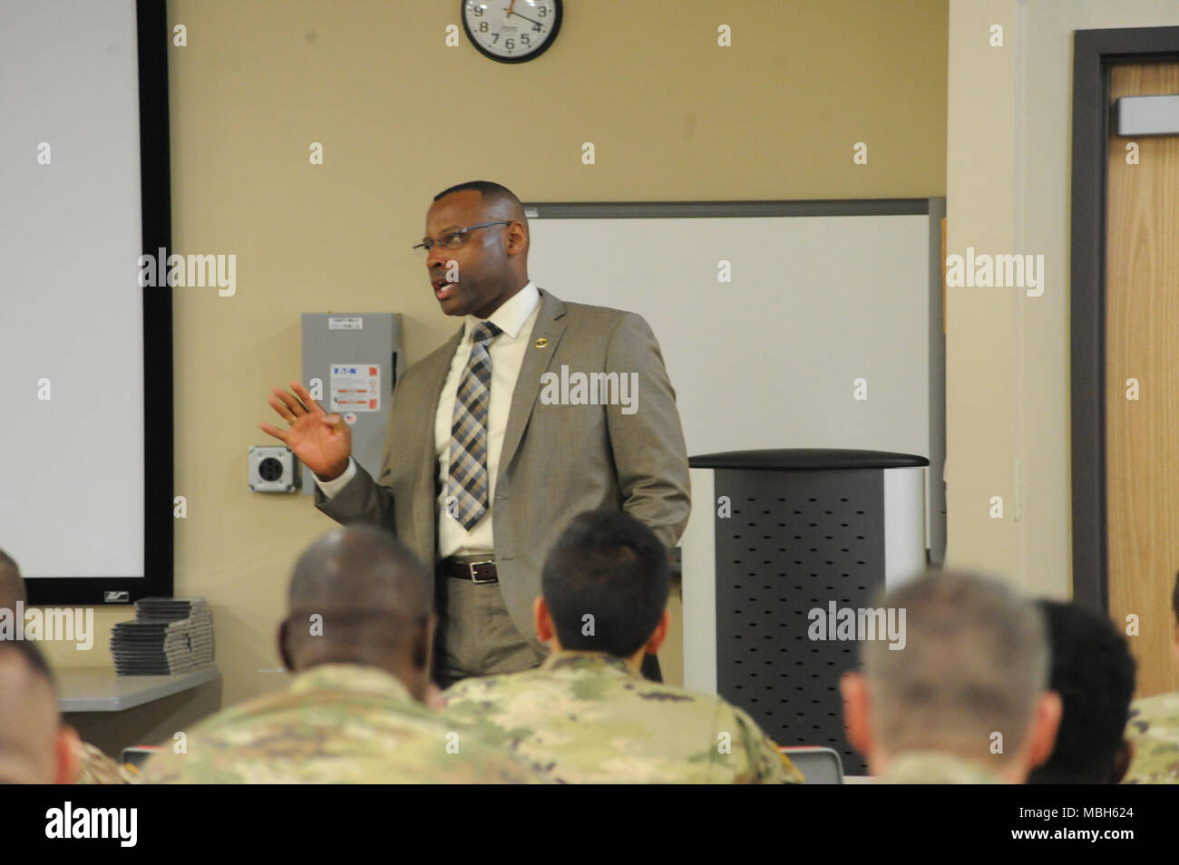 Retired Command Sgt. Maj. Charles Durr, Army Emergency Relief chief of  assistance, speaks to 10th Mountain Division (LI) Soldiers at Fort Drum,  New York, during a visit April 3. He met with