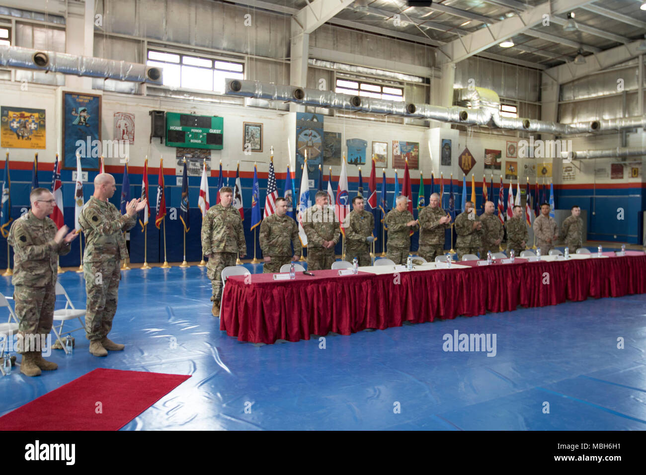 CAMP ARIFJAN, Kuwait  Wounded Warriors participating in an Operation  Proper Exit tour are welcomed to Camp Arifjan, Kuwait at the start of a  town hall meeting April 3, 2018. The eight