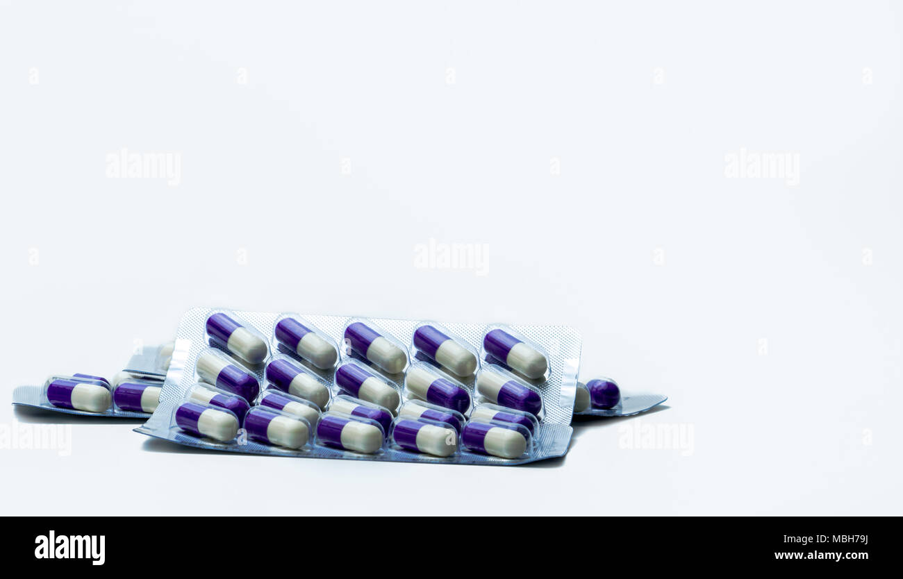 Fluconazole Antifungal medicine. Heap of pills in blister packs on