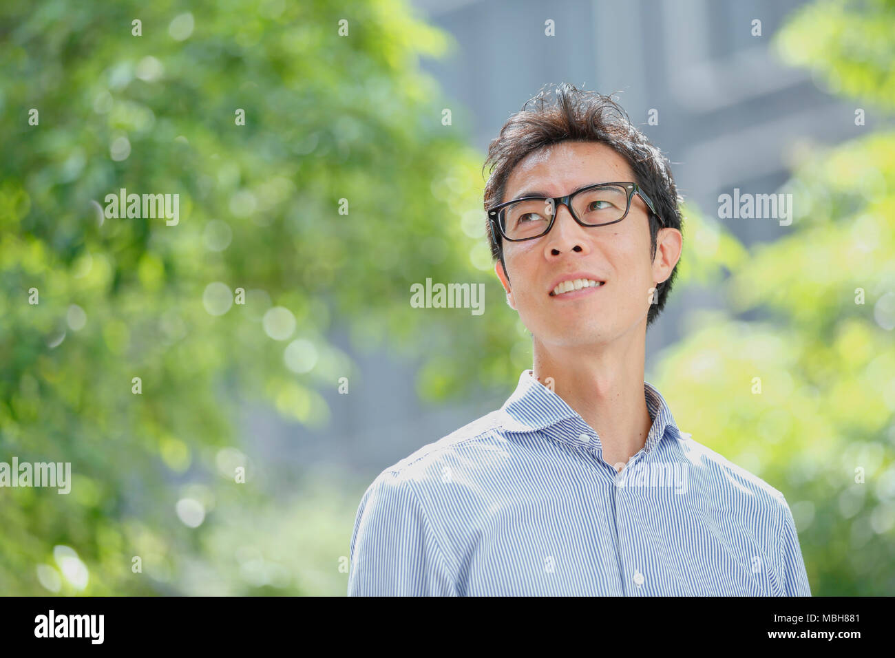 Japanese businessman downtown Tokyo Stock Photo