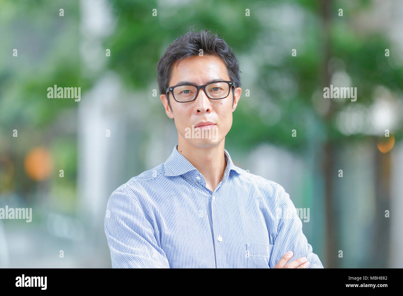 Japanese businessman downtown Tokyo Stock Photo