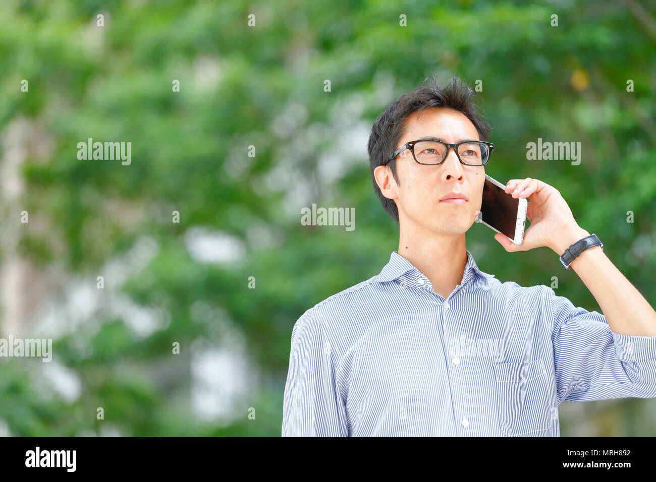 Japanese businessman downtown Tokyo Stock Photo