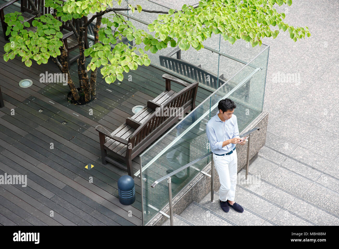 Japanese businessman downtown Tokyo Stock Photo