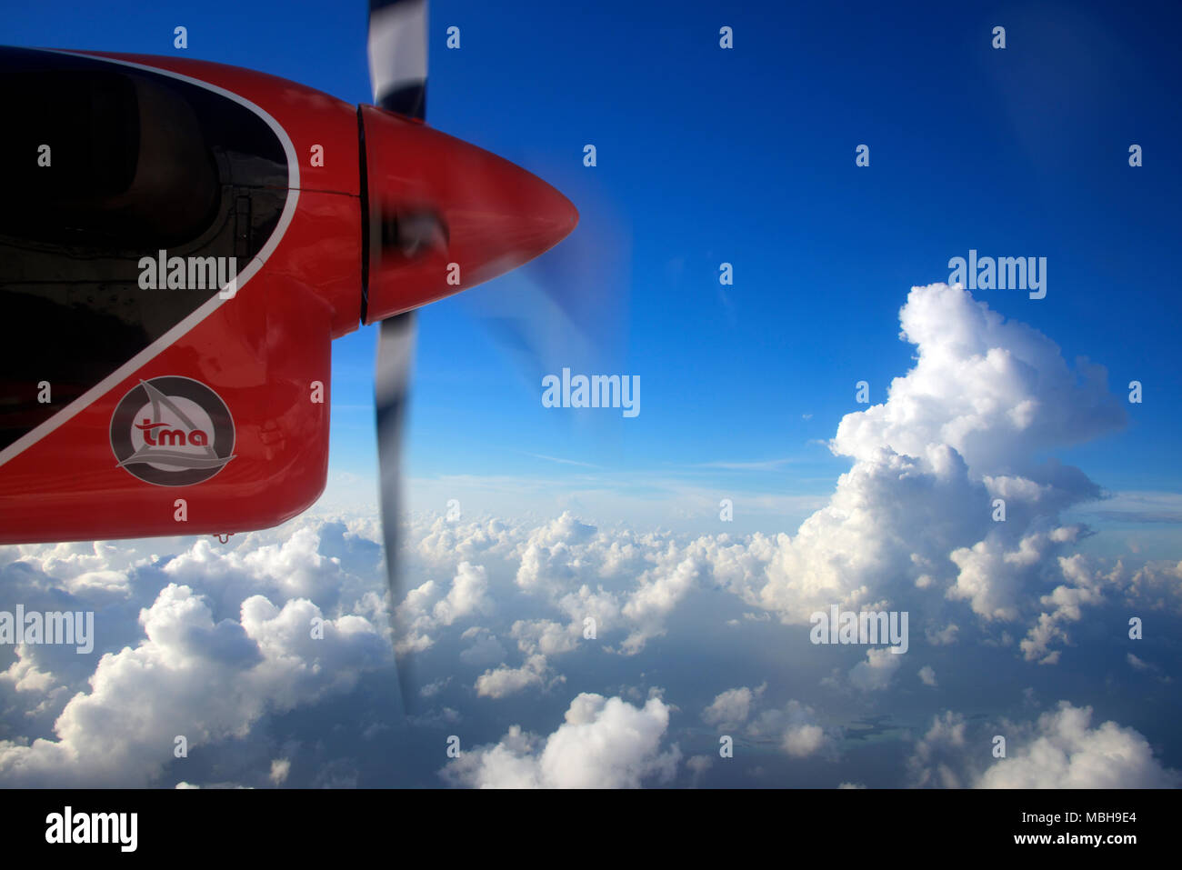 Turbo prop seaplane engine and clouds inter island transport Maldives Stock Photo