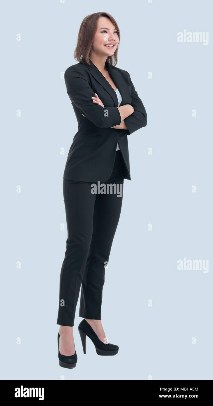 Full body portrait of a confident business womanlooking to the side ...