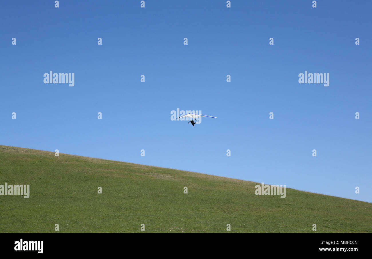 Hang glider over the mountain Stock Photo