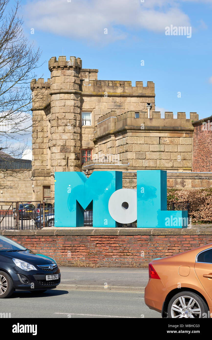 Museum of Lancashire logo with the courthouse in which it's hosted in the background. Portrait orientation. The museum has been closed since 2016. Stock Photo