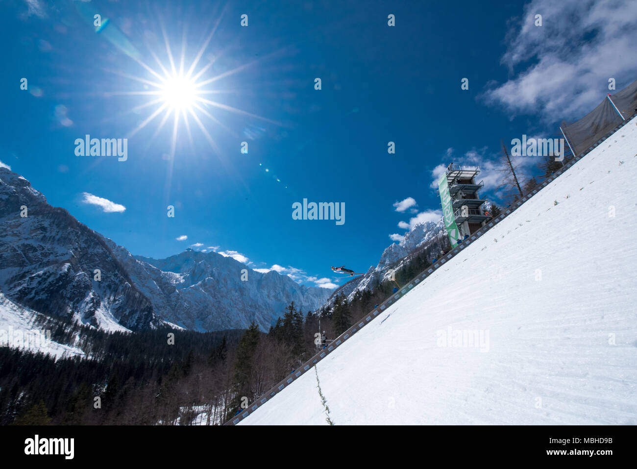 PLANICA, SLOVENIA - MARCH 24 2018 : Fis World Cup Ski Jumping Final - Hill and sun Stock Photo