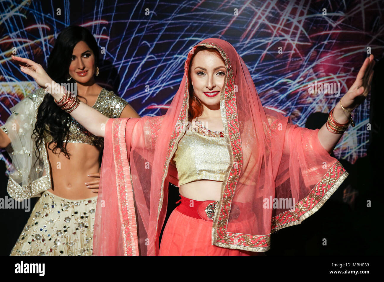 Dance performance at the Bollywood Experience, dedicated to Indian cinema at Madame Tussauds New York in the United States on Tuesday, 10. Visitors will come face to face with figures from some of India's most iconic stars including Shah Rukh Khan, Ashwarya Rai, Amitabh Bachchan, Kareena Kappor, Hrithik Roshan, Salman Khan, Katrina Kaif and Madhuri Dixit. Celebrating all things, Bollywood, vibrant art installations, projections and music will bring the experience to life. (PHOTO: WILLIAM VOLCOV/BRAZIL PHOTO PRESS) Stock Photo