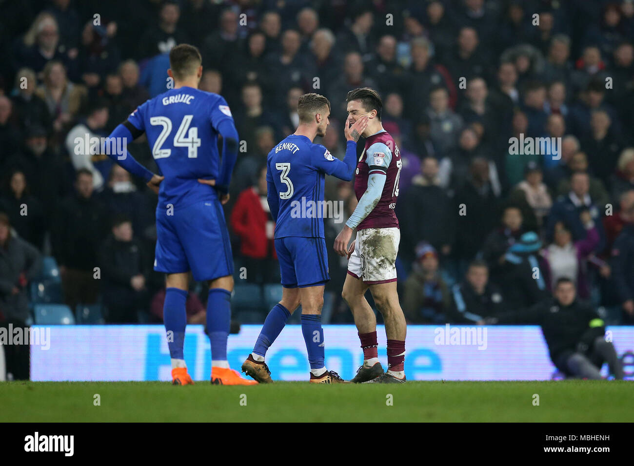 Birmingham, Midlands, UK. 10th April, 2018. Jack Grealish of Aston Villa gets a slap from Joe Bennett of Cardiff city.  EFL Skybet Championship match, Aston Villa v Cardiff City at Villa Park in Birmingham on Tuesday 10th April 2018.  this image may only be used for Editorial purposes. Editorial use only, license required for commercial use. No use in betting, games or a single club/league/player publications. pic by  Andrew Orchard/Andrew Orchard sports photography/Alamy Live news Stock Photo
