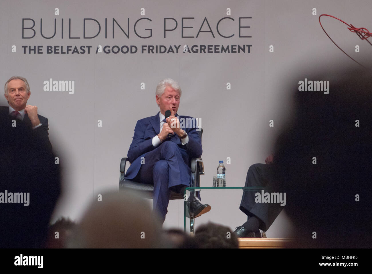 Belfast, Northern Ireland. 10th April, 2018. Building Peace Event celebrating the 20th Anniversary of the Good Friday Agreement in Belfast, Northern Ireland, United Kingdom at Queen's University with Bill Clinton, Tony Blair, Bertie Ahern and Senator George J Mitchell Credit: Daniel Bradley/Alamy Live News Stock Photo
