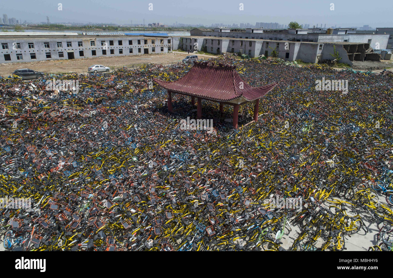 Wuhan, Wuhan, China. 9th Apr, 2018. Wuhan, CHINA-9th April 2018: Numerous abandoned public shared bikes can be seen in Wuhan, central China's Hubei Province. Credit: SIPA Asia/ZUMA Wire/Alamy Live News Stock Photo
