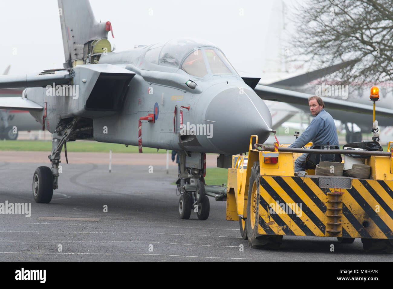 IWM Duxford, Cambridgeshire, UK. 11 April 2018. Imperial War Museums, working with RAF Marham, add Tornado GR4 ZA469 to the displays at IWM Duxford. Tornado GR4 ZA469 is transported from the Conservation Hall in AirSpace to the Battle of Britain exhibition, where it goes on display to visitors from 11 April 2018. The Tornado GR4 is the most significant combat jet used by the RAF during the last 27 years and continues in service until 2019. Credit: Malcolm Park/Alamy Live News. Stock Photo