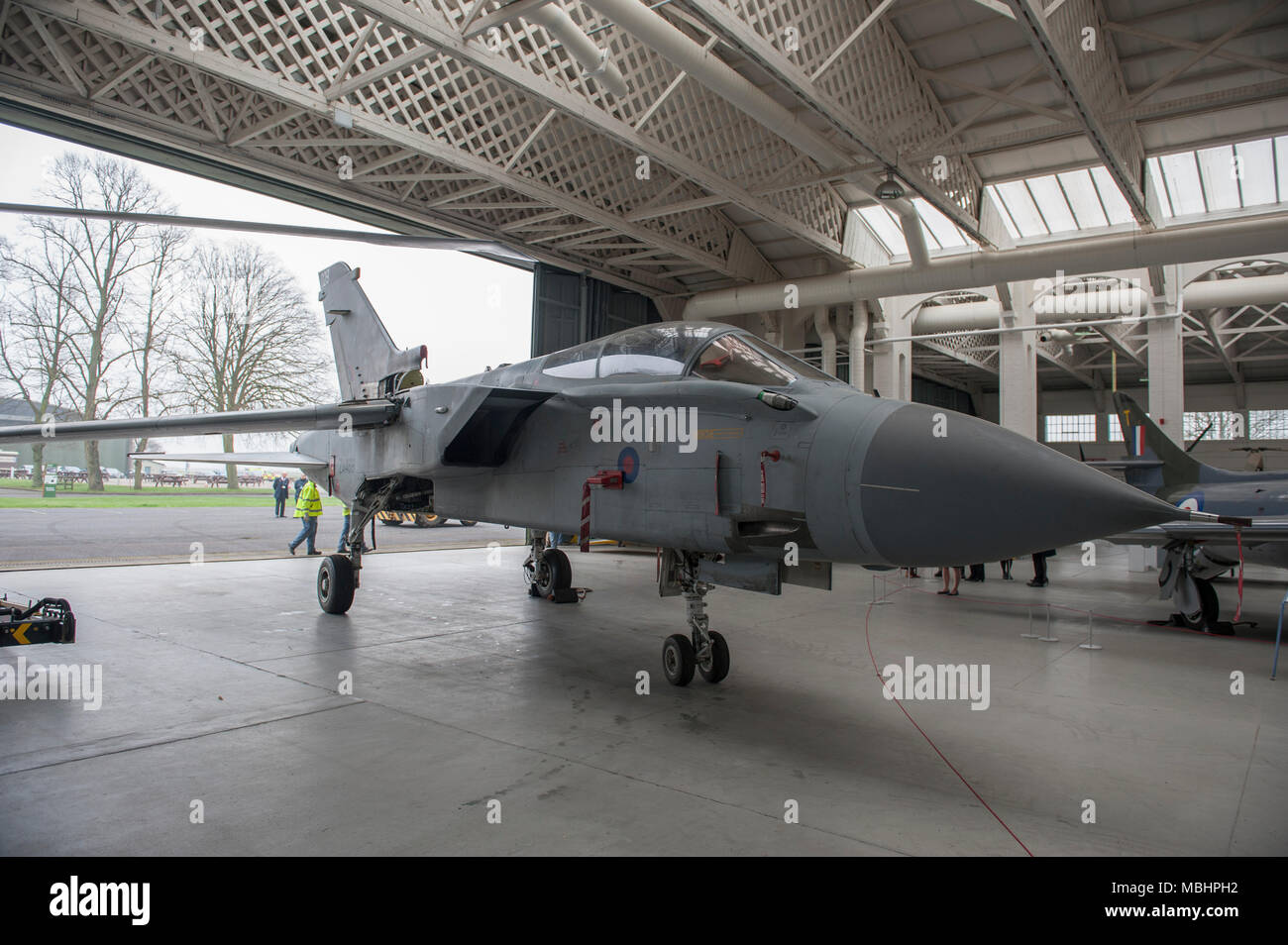 IWM Duxford, Cambridgeshire, UK. 11 April 2018. Imperial War Museums, working with RAF Marham, add Tornado GR4 ZA469 to the displays at IWM Duxford. Tornado GR4 ZA469 is transported from the Conservation Hall in AirSpace to the Battle of Britain exhibition, where it goes on display to visitors from 11 April 2018. The Tornado GR4 is the most significant combat jet used by the RAF during the last 27 years and continues in service until 2019. Credit: Malcolm Park/Alamy Live News. Stock Photo