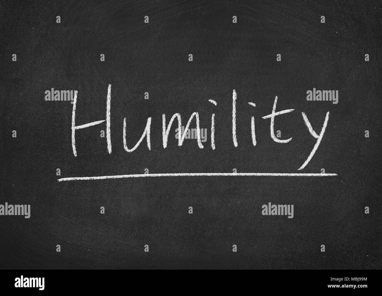 humility concept word on a blackboard background Stock Photo