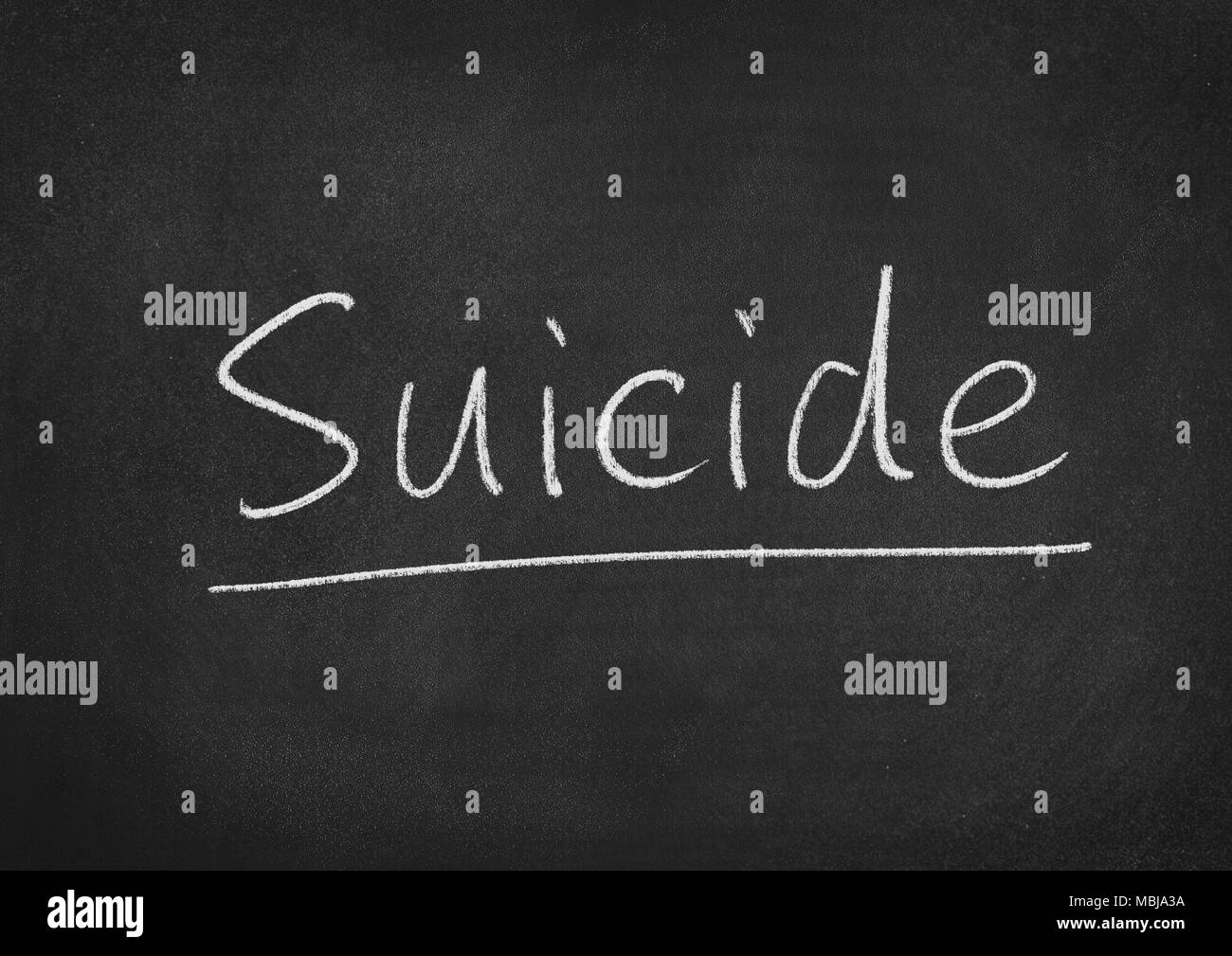 suicide concept word on a blackboard background Stock Photo
