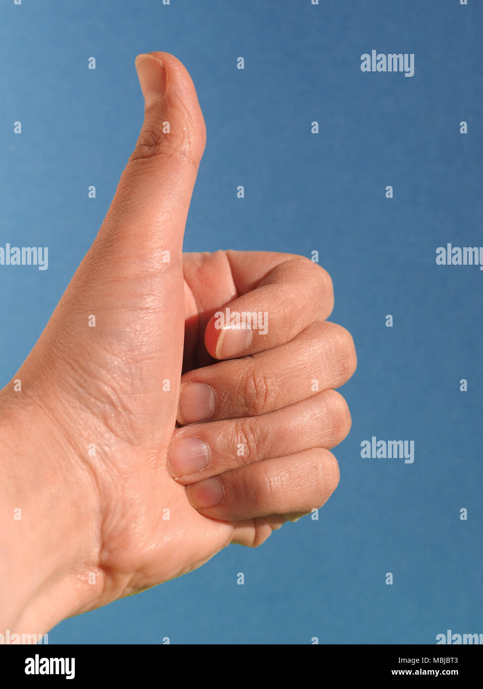 Thumb Up Sign Over Blue Sky Meaning Yes Or Ok Stock Photo Alamy Thumb Up Sign Over Blue Sky Meaning Yes Or Ok Stock Photo Alamy